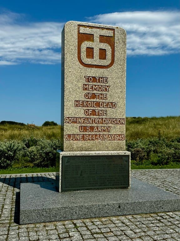 Monument with TO To the memory of the heroic dead of the 90th Infantry division US Army 6 June 1944 - 9 May 1945 at Utah Beach France