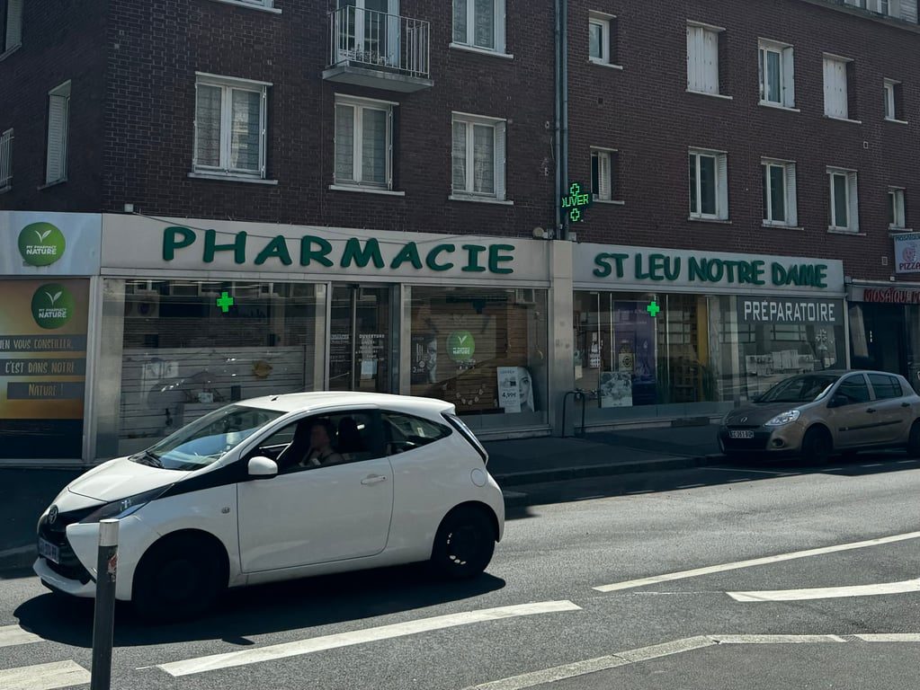 A pharmacy sign in Comic Sans in Amiens, France